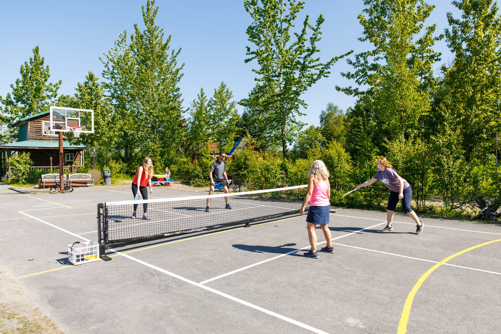 Regulation outdoor pickleball court and children's playground