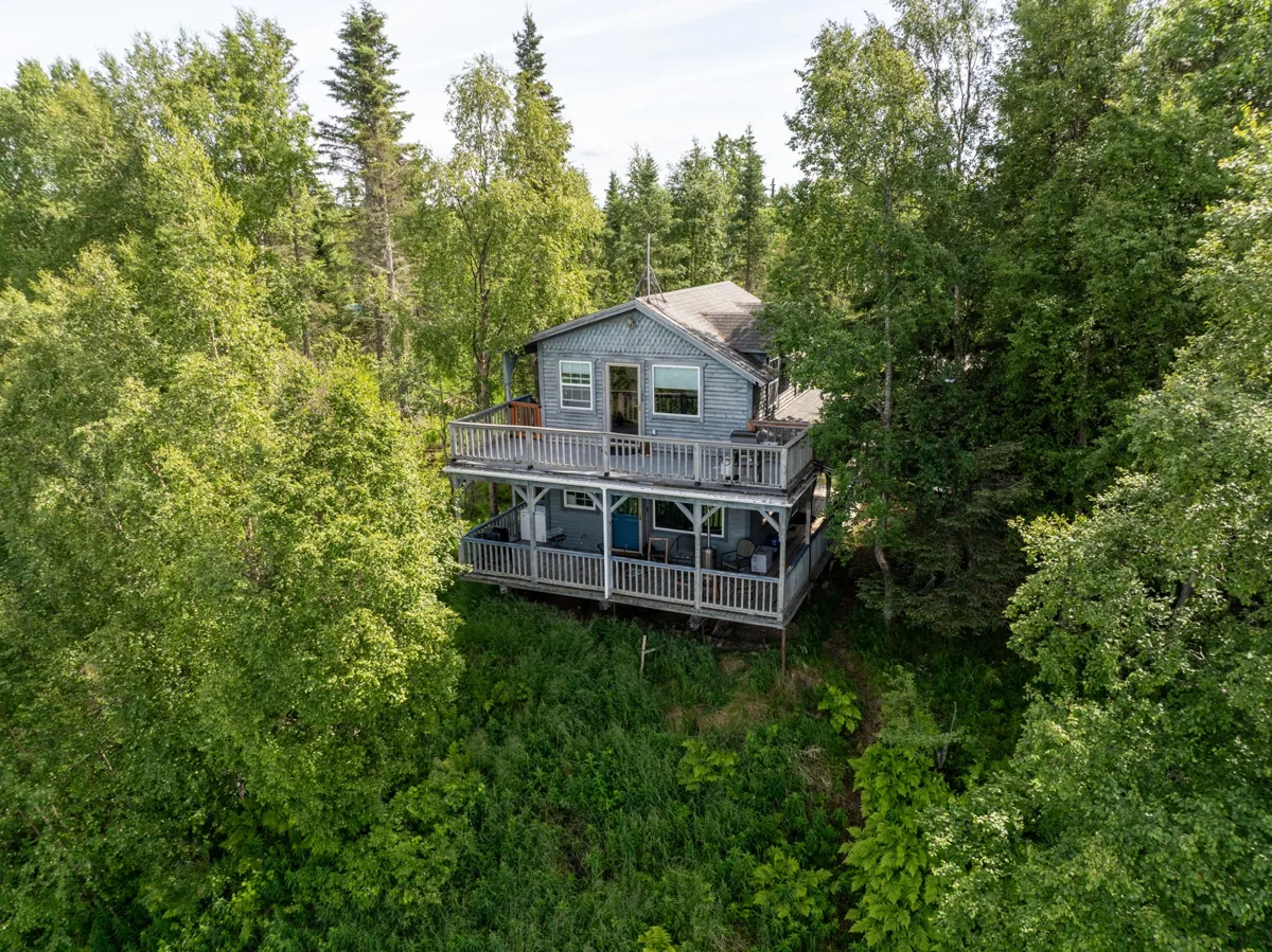 Diamond M Ranch historic suites and authentic Alaskan timber cabins at sunset